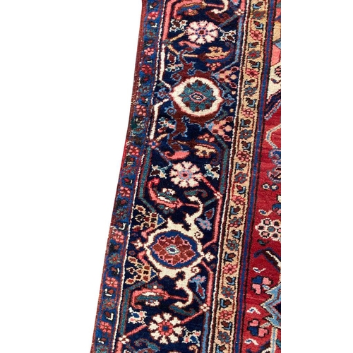 55 - ANTIQUE PERSIAN HERIZ CARPET, 314cm x 230cm.