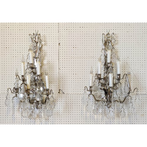 118 - WALL SCONCES, a pair, each approx 65cm H with polished metal frames and cut glass droplets. (2)