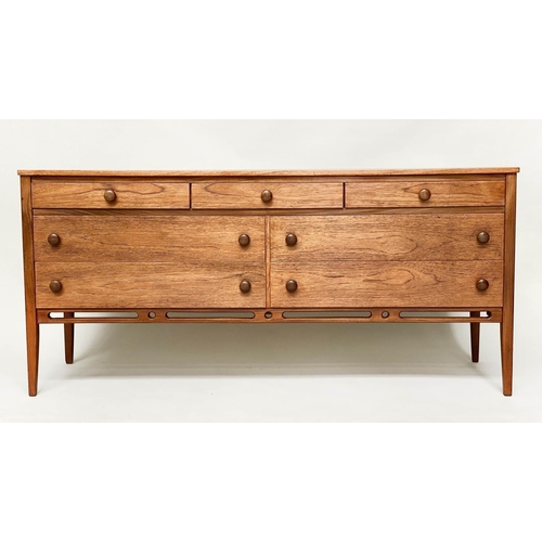 281 - LOW CHEST, mid 20th century teak with seven drawers in the manner of Heals, 148cm x 69cm H x 46cm.