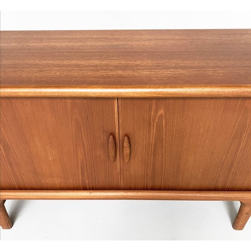 284 - DYRLUND SIDEBOARD, 1970s teak with two stitching doors enclosing baize lined trays and shelf, 168cm ... 