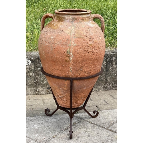 130 - OLIVE JAR ON STAND, antique Mediterranean terracotta on wrought iron stand, 80cm H.