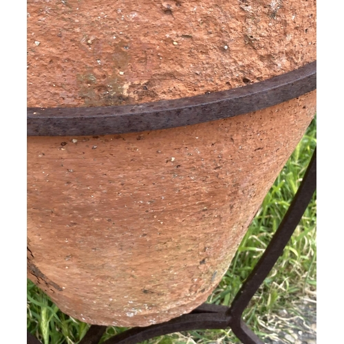 130 - OLIVE JAR ON STAND, antique Mediterranean terracotta on wrought iron stand, 80cm H.