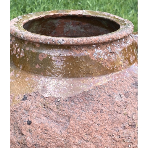 130 - OLIVE JAR ON STAND, antique Mediterranean terracotta on wrought iron stand, 80cm H.