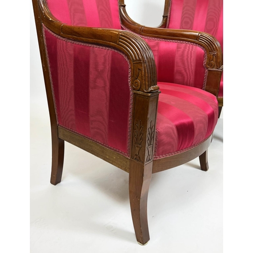 121 - BERGERES, a near pair, each 60cm x 93cm H, Restauration period, circa 1820, in striped red fabric wi... 