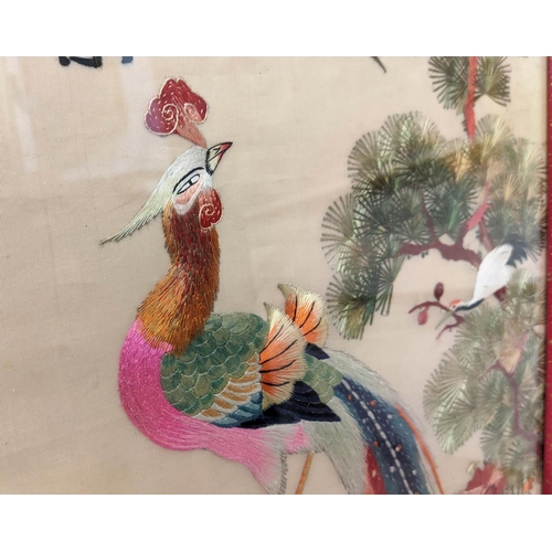 20 - CHINESE SILK PANELS, two similar, early 20th century, each depicting a colourful bird of paradise on... 