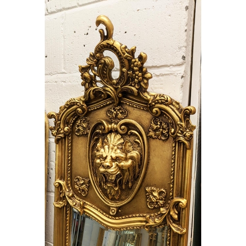 342 - WALL PIER MIRRORS, a pair, 178cm x 58cm, Belle Époque style, gilt frames with lion head detail. (2)