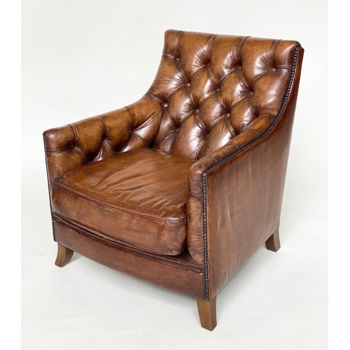 106 - ARMCHAIR AND STOOL, deep buttoned mid brown leather and brass studded upholstered with swept support... 