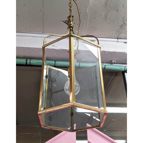 475 - HALL LANTERN, gilt metal and glazed, 105cm drop.