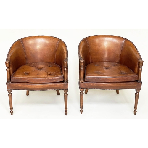 101 - TUB ARMCHAIRS, a pair, Club style brass studded tan leather with button cushion seat and rounded bac... 