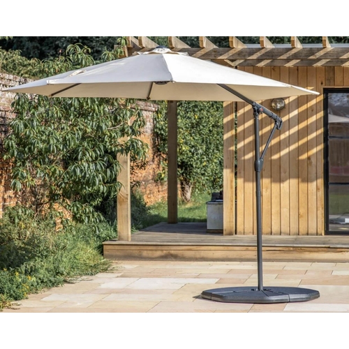 337 - CANTILEVERED GARDEN PARASOL, neutral fabric, includes base, 300cm x 245cm H x 300cm.