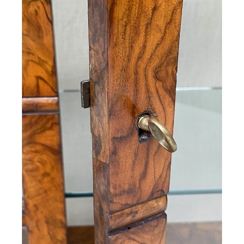 176 - ART DECO DISPLAY CABINET, burr walnut with two glazed doors and shelves, 108cm H x 79cm W x 33cm D.