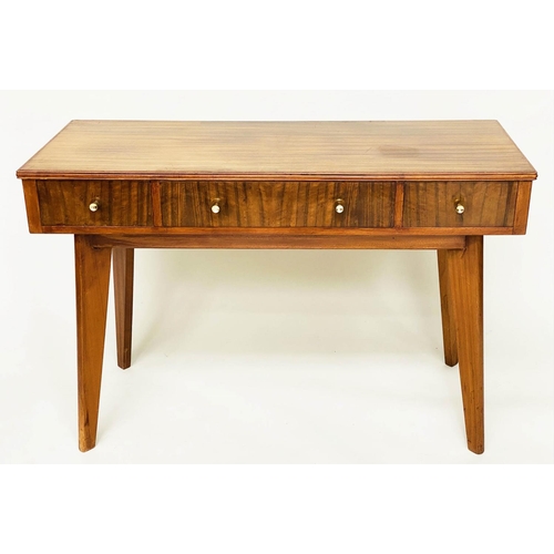 273 - WRITING TABLE, 1970s teak and Indian laurel with three frieze drawers and tapering out swept support... 