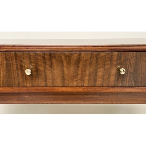 273 - WRITING TABLE, 1970s teak and Indian laurel with three frieze drawers and tapering out swept support... 