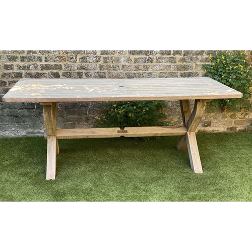 277 - GARDEN TABLE, rectangular weathered teak and slatted with substantial X frame support, 86cm x 183cm ... 