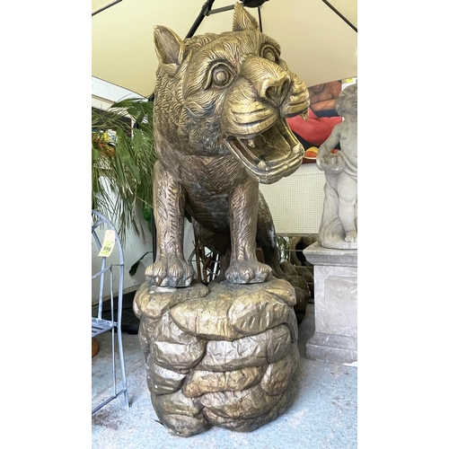 10 - TIGER, of large proportions, carved wood with brass cladding mounted on rock effect base, 245cm L x ... 