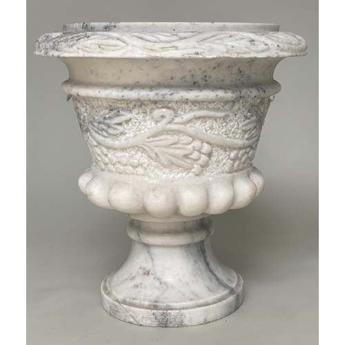 104 - MARBLE URNS, a pair, carved urns with ram's mask and swag foliate decoration, 40cm W x 40cm H. (2)