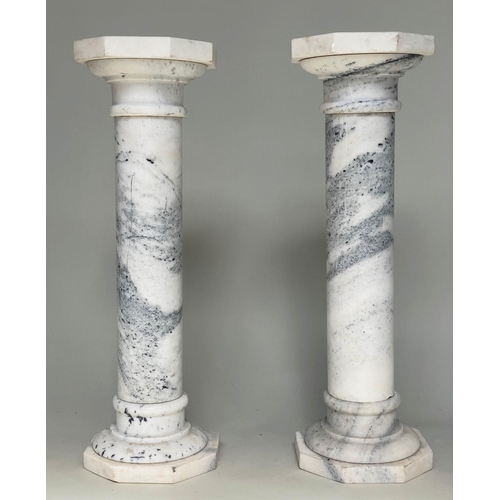 106 - MARBLE COLUMNS, a pair, white marble with octagonal top and bases, 102cm H x 33cm W. (2)