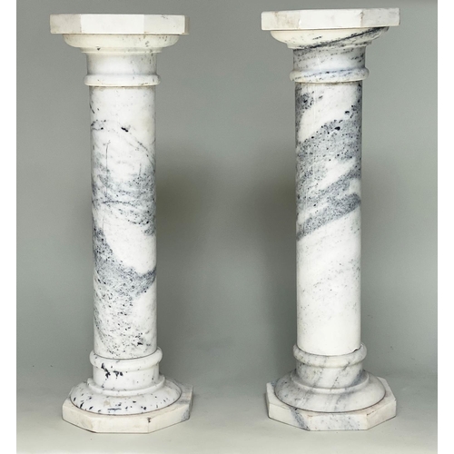 106 - MARBLE COLUMNS, a pair, white marble with octagonal top and bases, 102cm H x 33cm W. (2)