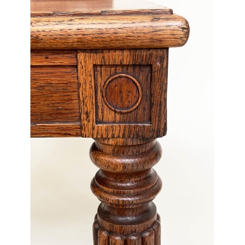 108 - HALL CHAIRS, a pair, 19th century oak each with scroll and escutcheon carved backs and reeded front ... 