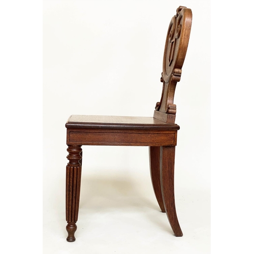 108 - HALL CHAIRS, a pair, 19th century oak each with scroll and escutcheon carved backs and reeded front ... 