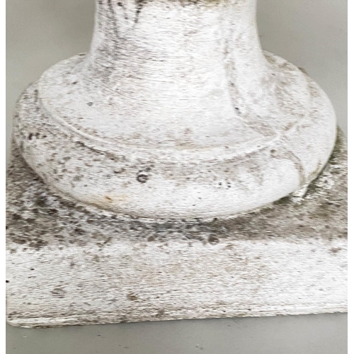 109 - GARDEN FINIALS, a pair, weathered reconstituted stone modelled as cornucopia/fruit, 50cm H. (2)