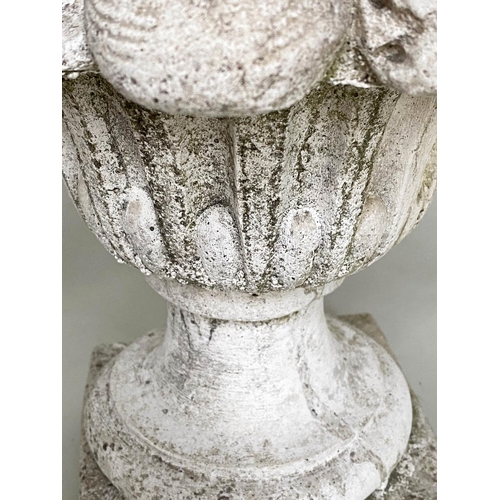 109 - GARDEN FINIALS, a pair, weathered reconstituted stone modelled as cornucopia/fruit, 50cm H. (2)