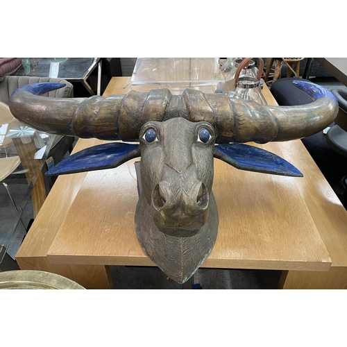 11 - WATER BUFFALO, carved wood with brass cladding and lapis lazuli ears, eyes and horns, 145cm W x 100c... 