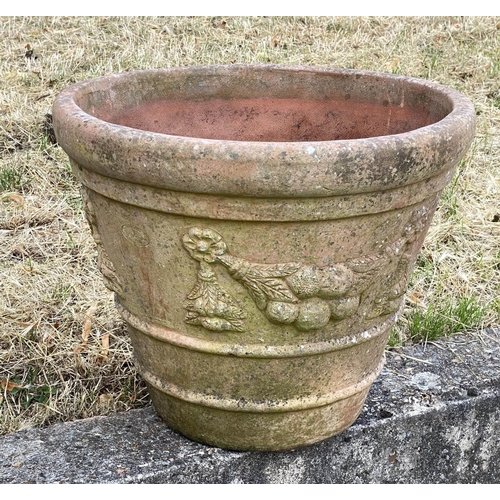 117 - GARDEN TERRACOTTA PLANTERS, a set of three, large weathered terracotta with fruit decoration, 57cm W... 