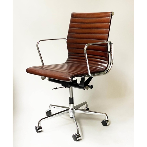 123 - REVOLVING DESK CHAIR, Charles and Ray Eames inspired with ribbed tan leather seat revolving and recl... 