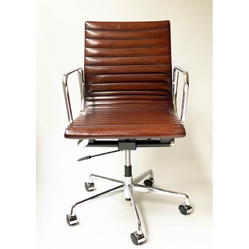 123 - REVOLVING DESK CHAIR, Charles and Ray Eames inspired with ribbed tan leather seat revolving and recl... 