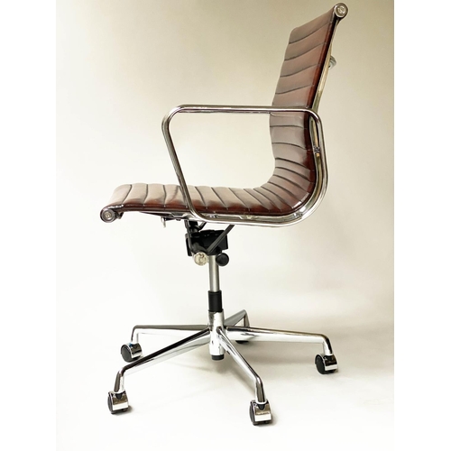 123 - REVOLVING DESK CHAIR, Charles and Ray Eames inspired with ribbed tan leather seat revolving and recl... 