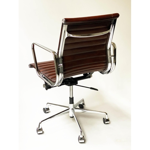 123 - REVOLVING DESK CHAIR, Charles and Ray Eames inspired with ribbed tan leather seat revolving and recl... 