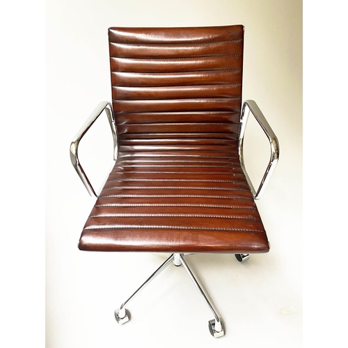 123 - REVOLVING DESK CHAIR, Charles and Ray Eames inspired with ribbed tan leather seat revolving and recl... 