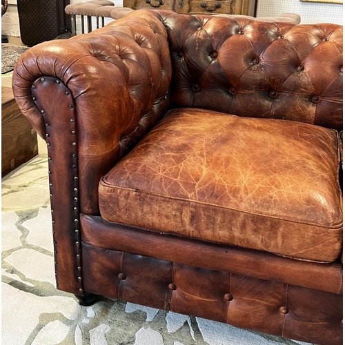 136 - CHESTERFIELD SOFA, three seater, buttoned and studded tan leather, 210cm W.