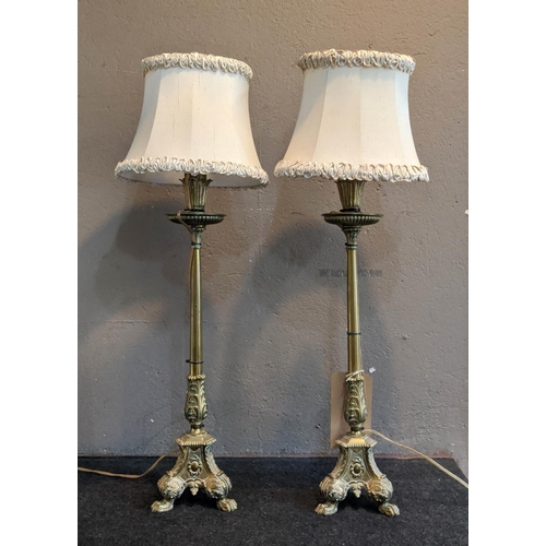 141 - A PAIR OF BRASS TABLE LAMPS, Empire style, triform scrolled decoration, acanthus, scrolled column, c... 