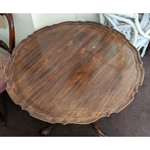 145 - TRIPOD TABLE, George III mahogany with pie crust tilting top, baluster turned column, raised on cabr... 