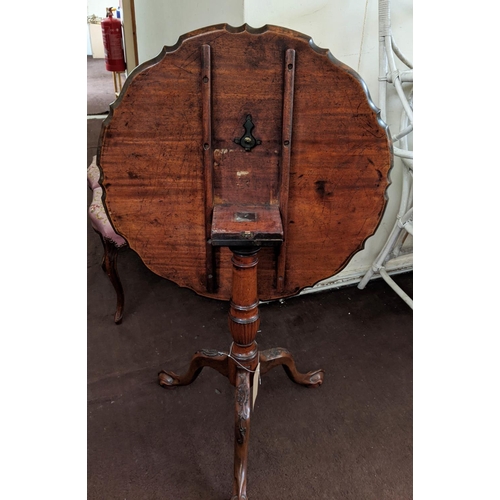 145 - TRIPOD TABLE, George III mahogany with pie crust tilting top, baluster turned column, raised on cabr... 