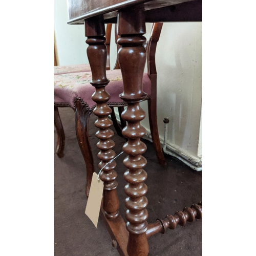 149 - SIDE TABLE, Victorian, plus two Victorian chairs, the mahogany table raised on bobbin legs, 69cm H x... 