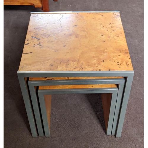 151 - NEST OF TABLES, burr maple veneered in Art Deco style, a set of three, steel edged, largest 42cm H x... 