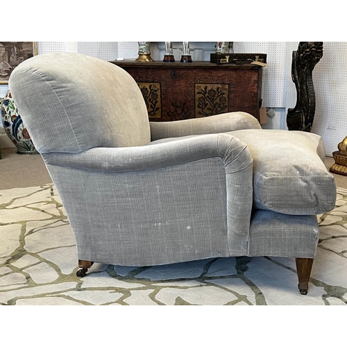 194 - HOWARD STYLE ARMCHAIR, velvet upholstered with tapered front supports and castors, 86cm W