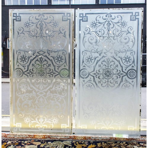 247 - GLASS PANES, 120cm x 61cm and 119cm x 61cm, two with etched decoration. (2)