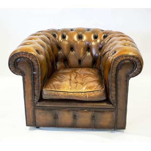 254 - CHESTERFIELD ARMCHAIR, 70cm H x 104cm W, brown leather on castors.