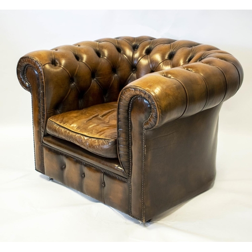 254 - CHESTERFIELD ARMCHAIR, 70cm H x 104cm W, brown leather on castors.