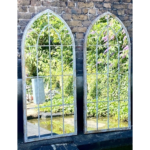 369 - ARCHITECTURAL WALL MIRRORS, a pair, 160cm high, 67cm wide, Gothic arched design, aged metal frames. ... 