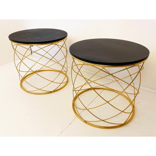 375 - SIDE TABLES, a pair, 45cm H x 46cm diam., 1970s Italian style, gilt metal bases, ebonised circular w... 