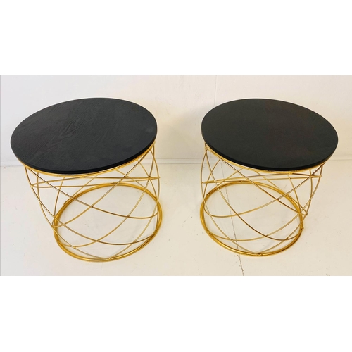 375 - SIDE TABLES, a pair, 45cm H x 46cm diam., 1970s Italian style, gilt metal bases, ebonised circular w... 