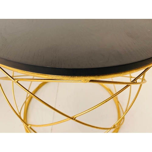 375 - SIDE TABLES, a pair, 45cm H x 46cm diam., 1970s Italian style, gilt metal bases, ebonised circular w... 