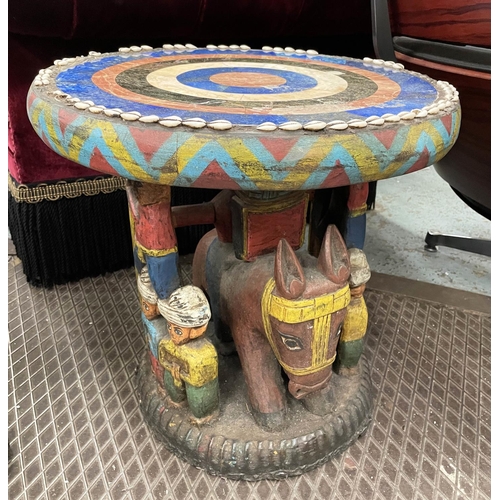 425 - SIDE TABLES, two, carved wood with figural bases and round lapis lazuli with marble and cowrie shell... 