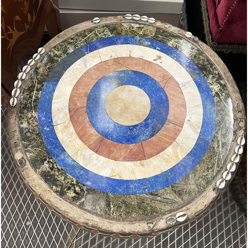 425 - SIDE TABLES, two, carved wood with figural bases and round lapis lazuli with marble and cowrie shell... 