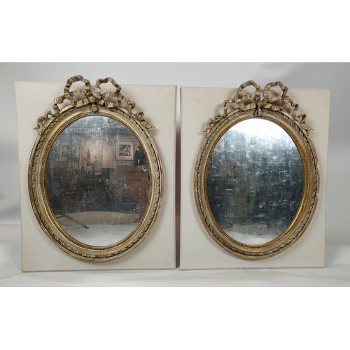 266 - WALL MIRRORS, a pair, Louis XVI style, applied to later boards, painted finish, 19th century oval fr... 